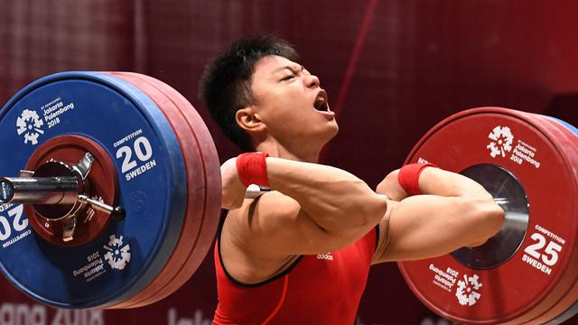 SEA Games 2019: Rahmat Erwin Abdullah Sumbang Medali Emas Keempat di Cabor Angkat Besi 