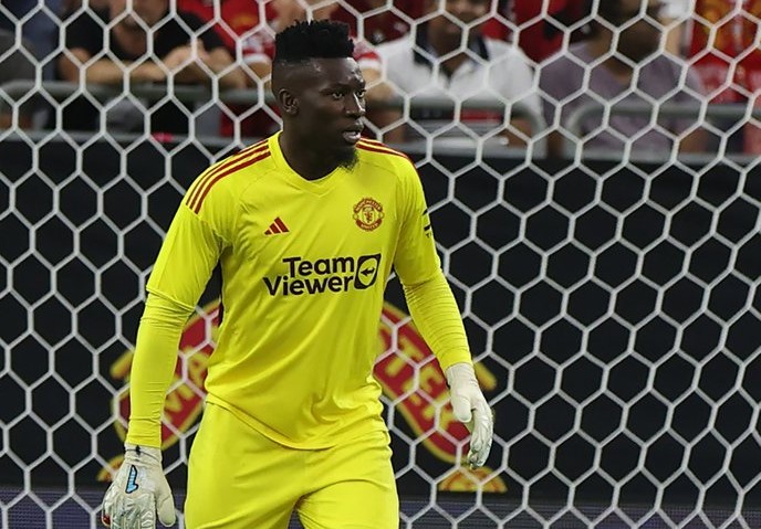 Penilaian Erik Ten Hag soal Debut Andre Onana