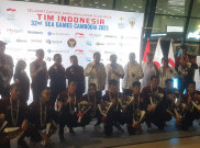 Berkalung Medali Emas dan Bunga, Tim Voli Indoor Putra Indonesia Tiba di Tanah Air