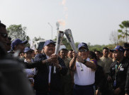 Arak-arakan Api Obor Asian Games 2018 di Palembang Spektakuler