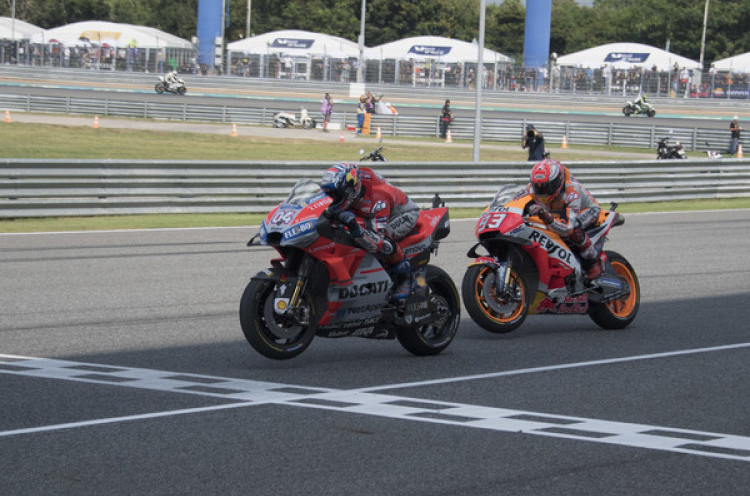  Berpeluang Kunci Gelar di MotoGP Thailand, Marc Marquez Waspadai Andrea Dovizioso 
